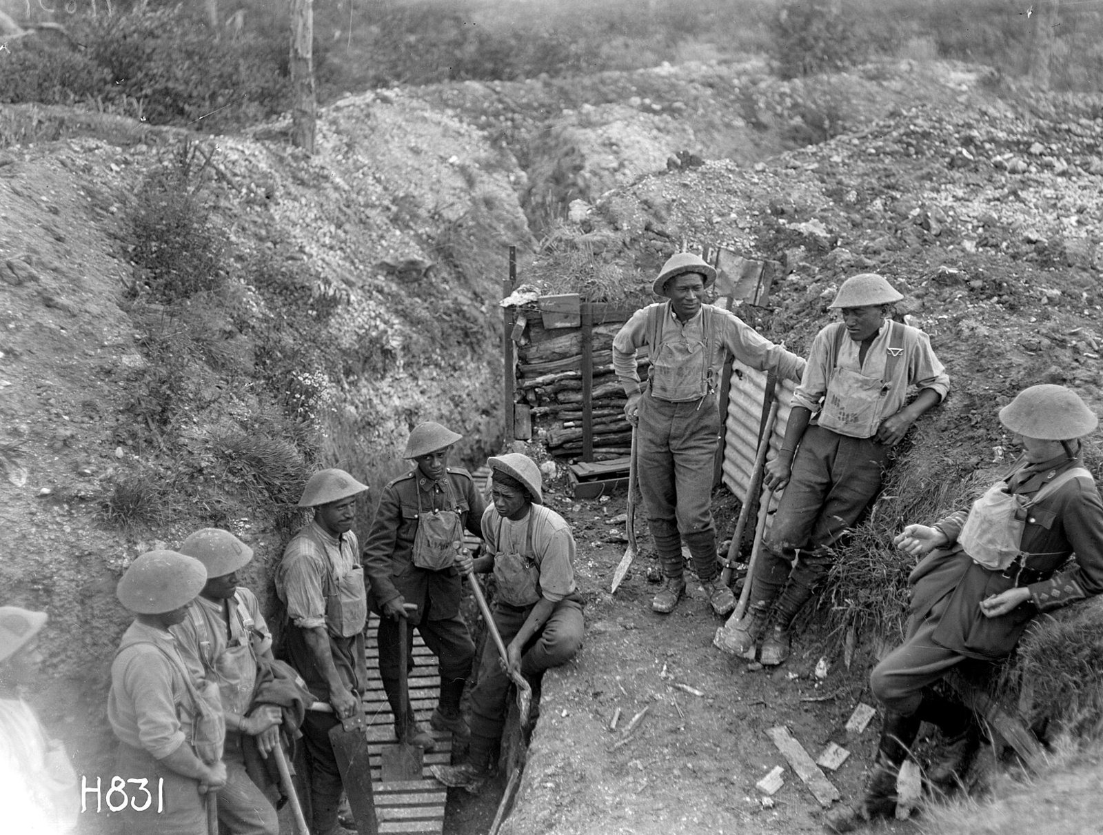 Māori Pioneer Battalion soldiers taking a break from trench work near Gommecourt, France, 1918